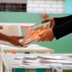 URGENTE: Falta de VERBA no MEC pode deixar SEU FILHO sem LIVRO ESCOLAR em 2026! 😱
